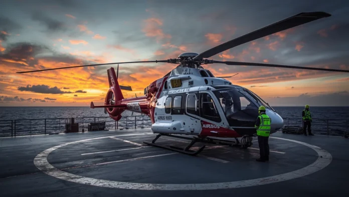 Airbus H160 helicopter on offshore oil platform helideck with crew conducting safety equipment checks representing FAA airworthiness directive for PLB and emergency life-raft system inspection June 2026